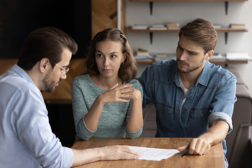Couple,of,angry,tenants,having,dispute,with,real,estate,agent,